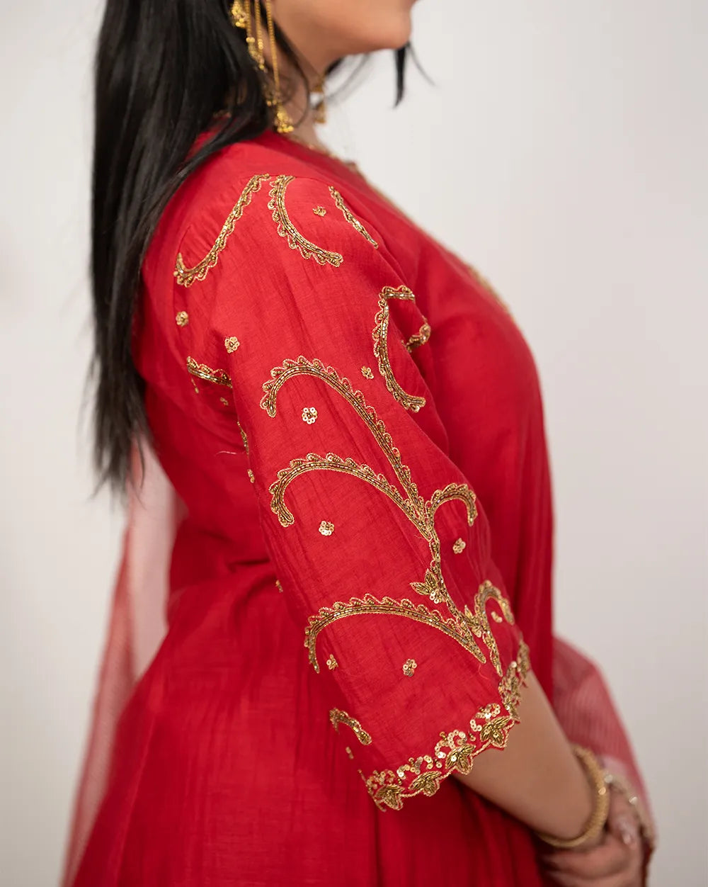 Handworked A-line panelled suit- red